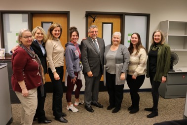 From left to right: Tanna Baker, Anne Clark, Kathleen Petrzelka, Susan Deschenes, SVC    President Christopher Villa, Cheryll Peterson, Naomi Peterson, and Paula Peterson. 